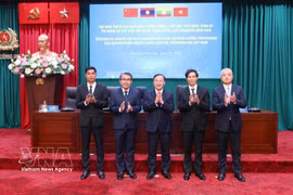 Senior Lieutenant General Nguyen Van Long, Vietnam's Deputy Minister of Public Security (centre) and heads of the delegations of Vietnam, China, Laos and Myanmar at the conference. (Photo: VNA)