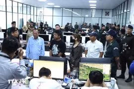 Police raid an online scam centre in Cambodia (Photo: AKP)