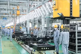 At THACO auto assembling factory (Photo: VNA)