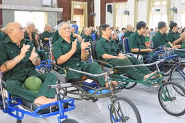 People with meritorious service to receive gifts on War Invalids and Martyrs' Day (Photo: qdnd.vn)