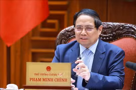 PM Pham Minh Chinh speaks at the event. (Photo: VNA)