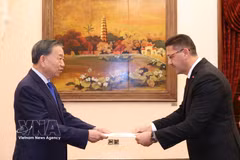 General Secretary of the Communist Party of Vietnam Central Committee and President To Lam (L) receives Palestinian Ambassador Shadi Abu Zarqa in Hanoi on October 3. (Photo; VNA)