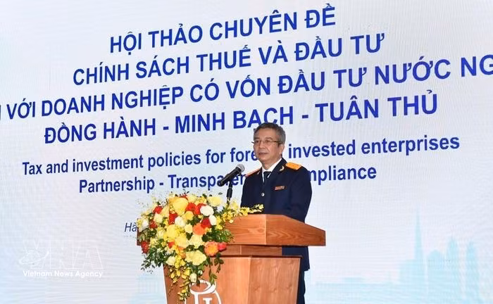 Mai Xuan Thanh, Director of the Tax Department speaks at the event (Photo: VNA)
