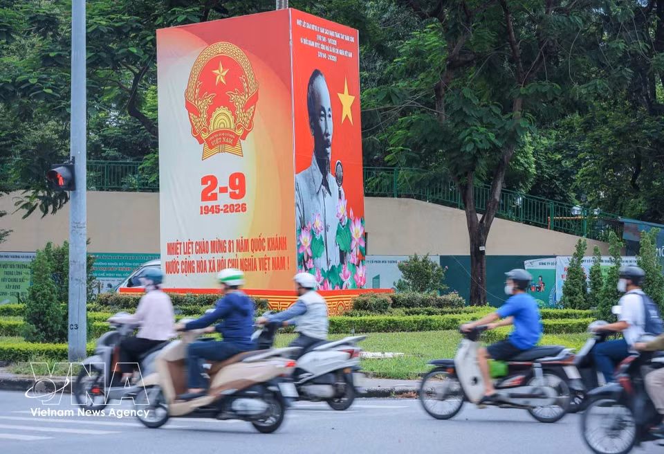 A large National Day billboard is prominently displayed on Nguyen Van Huyen street. (Photo: VNA)