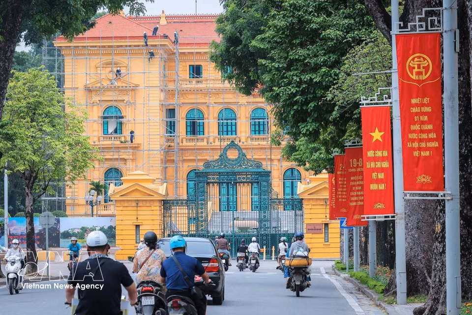 A colourful banner on Hoang Van Thu street celebrates the 81st anniversary of the August Revolution and National Day. (Photo: VNA)