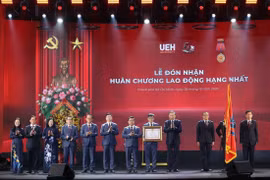 Top leader urges economics university to develop high-quality human resources, nurture talent