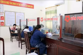 The Government issues Resolution No. 74/NQ-CP on a plan to implement the arrangement of administrative units and building a two-tier local government model - Illustrative image (Photo: VNA)