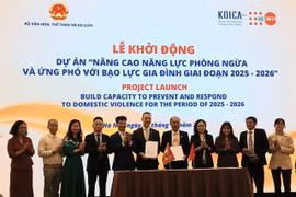 Representatives of the Ministry of Culture, Sports and Tourism and UNFPA at the signing ceremony of the cooperation agreement. (Photo: VNA)
