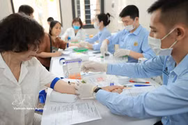 Residents in Hanoi's Bach Mai ward receive free health check-ups. (Photo: VNA) 