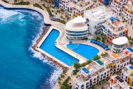 Santo Beach Club boasts a spectacular sea view and two infinity pools for guests. (Photo: Sun Group)