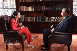 General Secretary of the Communist Party of Vietnam Central Committee and President To Lam (R) gives an interview to Bloomberg TV. (Photo: VNA)