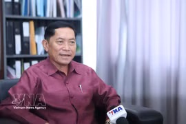 Director General of the Lao News Agency (KPL) Vannasin Simmavong in an interview with the Vietnam News Agency. (Photo: VNA)
