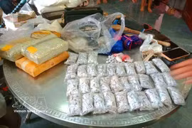 Synthetic drugs and heroin seized in the cases. (Photo: VNA) 