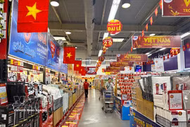 MM Mega Market An Phu supermarket in Ho Chi Minh City is brightly decorated for the National Day holiday. (Photo: VNA)