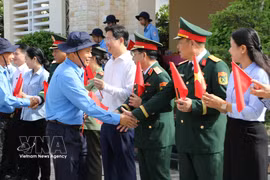 Team K91 members depart to carry out their mission. (Photo: VNA)