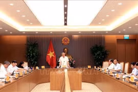 Permanent Deputy Prime Minister Nguyen Hoa Binh speaks at the meeting with leaders of several ministries and sectors on the building of several decrees guiding the National Assembly’s Resolution No. 222/2025/QH15 on the international financial centre in Vietnam (Photo: VNA)
