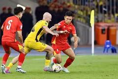 João Figueiredo (yellow) and teammates pull off a commanding performance to win at home. (Photo: VNA)