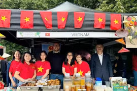 Vietnamese booth is well decorated (Photo: VNA)