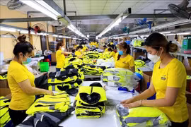 Vietnamese textile, footwear exporters eye target markets (Photo: VNA)