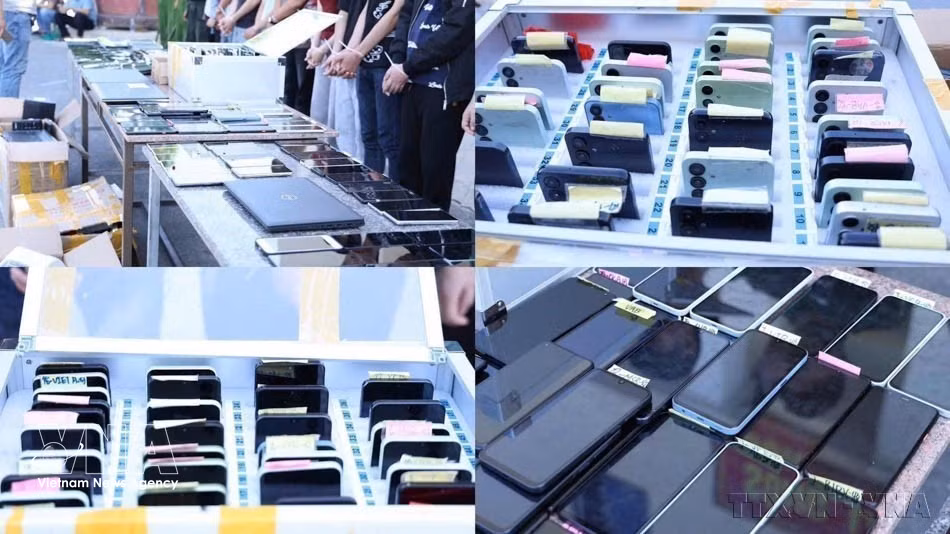 Evidence seized from a large-scale transnational money-laundering network dismantled by the Ha Tinh Provincial Public Security, July 15, 2026. (Photo: Published by VNA)