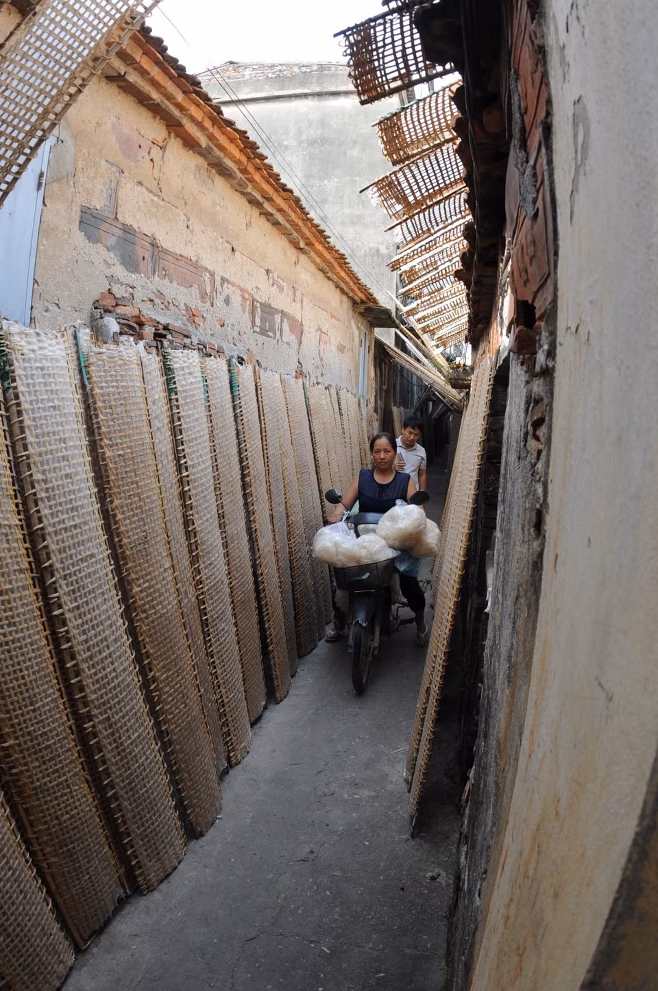 Rice papers can be seen drying along every alley in the village. (Photo: VNA)