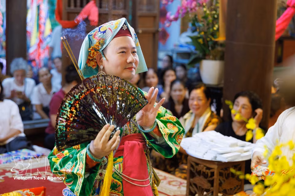 The blend of music, costumes and movement creates distinctive forms of expression in the traditional ritual. (Photo: Pham Tuan Anh/VNA)