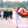 Party leaders of Vietnam, China pay tribute to President Ho Chi Minh
