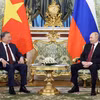 Party chief holds a brief meeting with Russian President