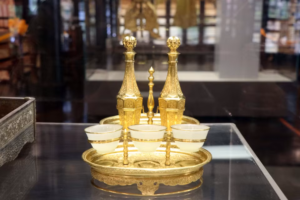 Gold wine flasks and cups made from gemstones during the reign of Emperor Khai Dinh. (Photo: VNA)