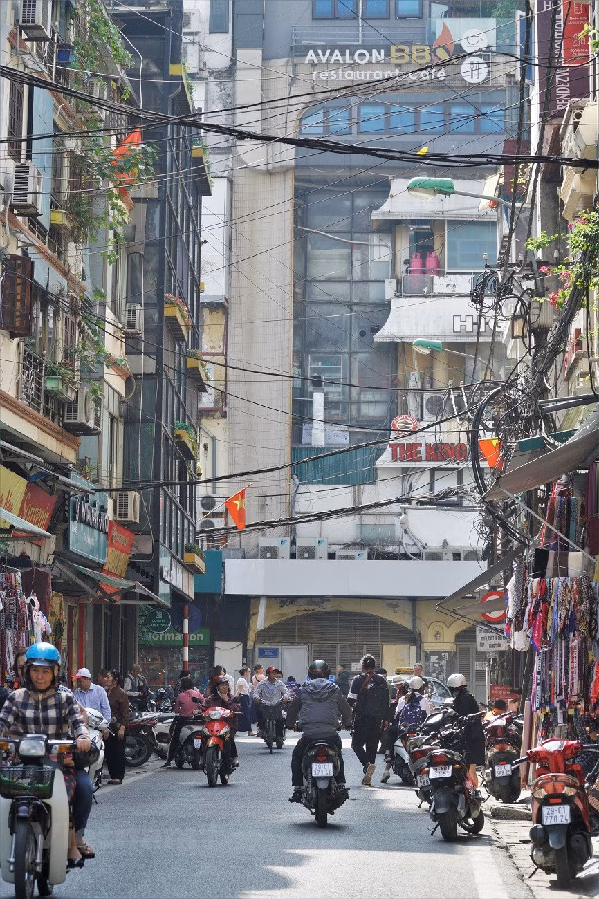 Dinh Liet street is considered as magnificent but ancient 'Hong Kong' by youngsters (Photo: Vietnam+)