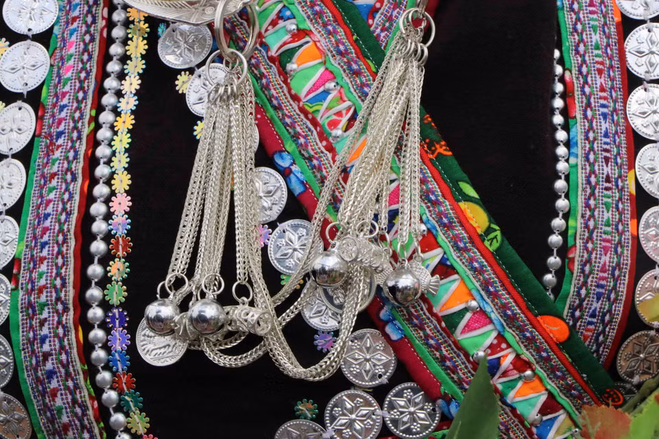 Silver accessories such as bracelets, earrings, and intricately-engraved ornaments are worn by Lao women as embellishments to their outfits. (Photo: VNA)