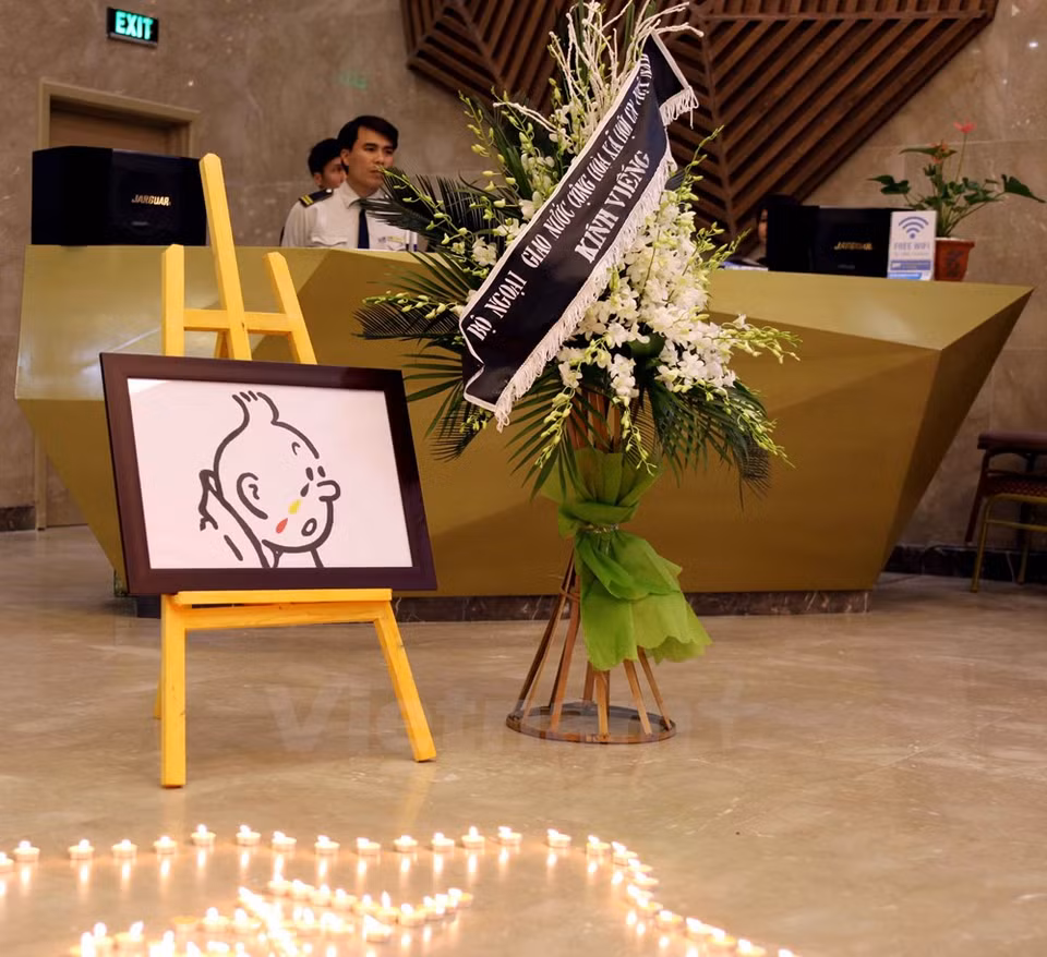 The image of cartoon character Tintin crying is displayed at the ceremony (Photo: VNA)