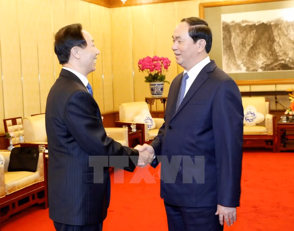 President Tran Dai Quang (R) receives Wang Jiarui, Vice Chairman of the Chinese People's Political Consultative Conference (Source: VNA)