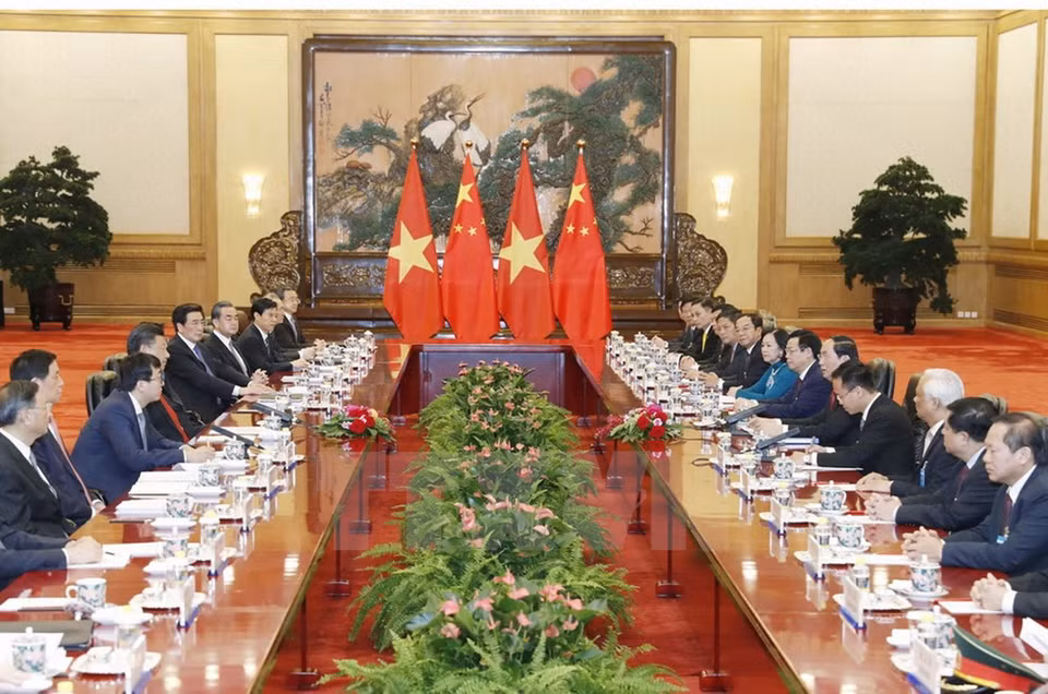 The talks between China’s Party General Secretary and President Xi Jinping and President Tran Dai Quang (Source: VNA)
