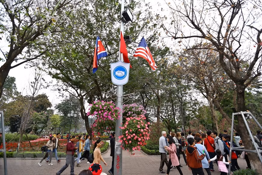 Hoan Kiem Lake area is decorated with flags of the United States, the Democratic People’s Republic of Korea and Vietnam (Photo: VNA)
