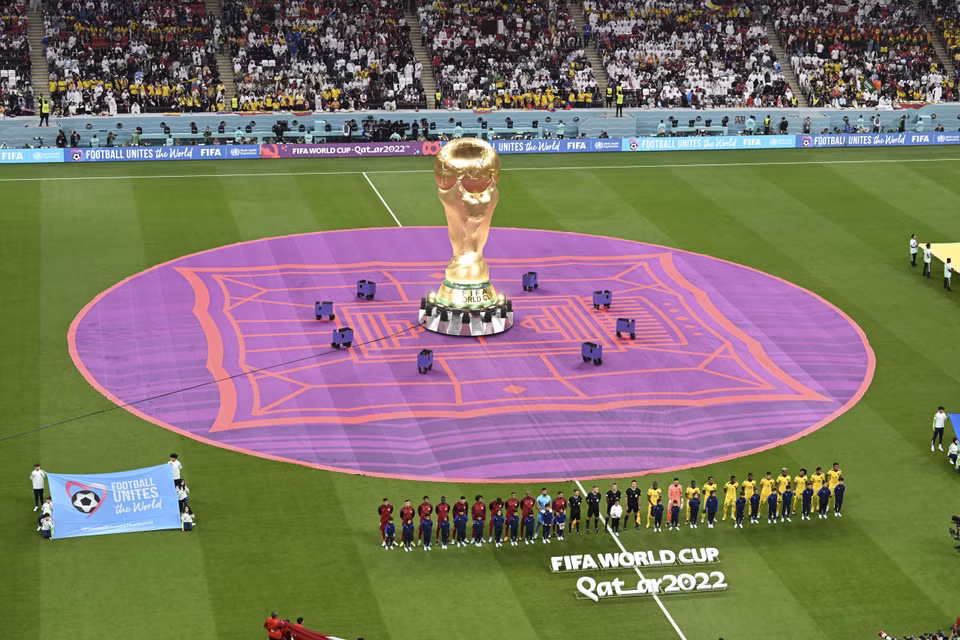 A replica of the World Cup is shown before the opening match of the 2022 World Cup between the home team Qatar and Ecuador at Al-Bayt Stadium in Al Khor, Qatar on November 20. (Photo: AFP/VNA)
