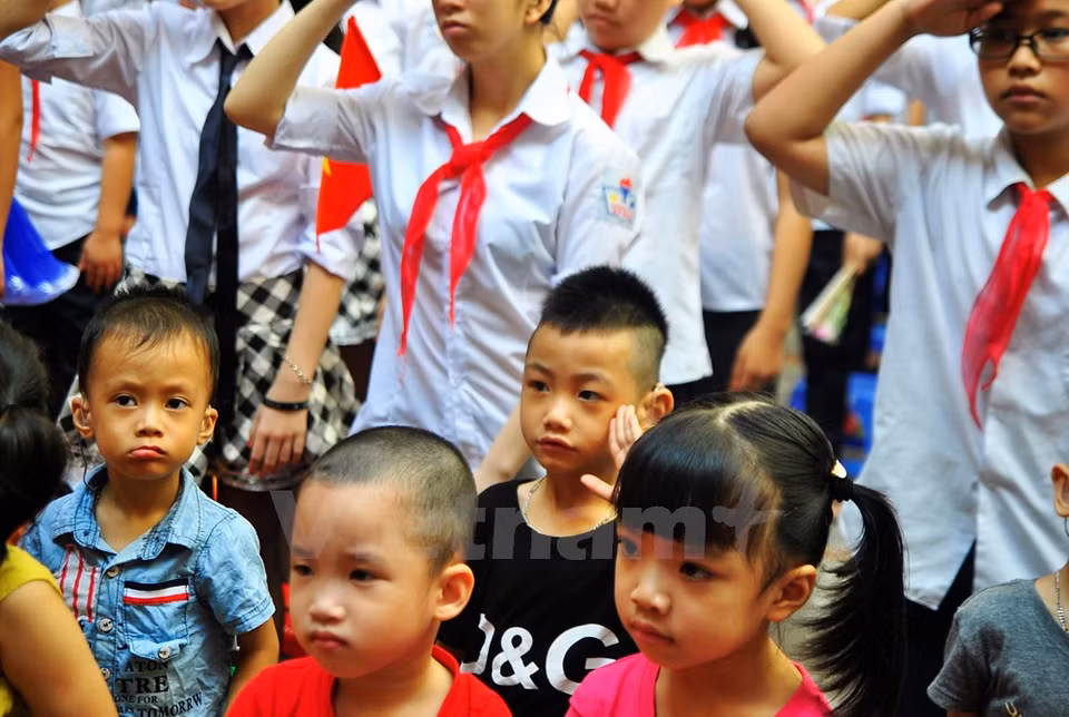 The first lesson they learn may be how to salute the flag (Source: VNA) 