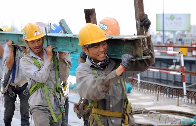 Workers at construction site (Source: VNA)