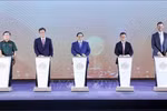 Prime Minister Pham Minh Chinh (middle) and delegates launch the Trump International Hung Yen project on May 21 with the ceremonial button-pressing. (Photo: VNA)