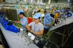 Production of electrical and electronic components at Minda Vietnam Auto Components Co., Ltd., an Indian-invested firm in Phu Tho province. (Photo: VNA)