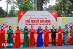 At the opening ceremony of the exhibition. (Photo: VNA)