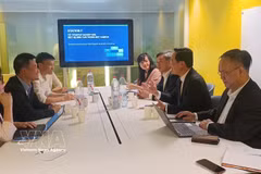 The meeting between the delegation from the CPV Central Committee’s Commission for Policy and Strategy and Station F (Photo: VNA)