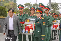 Remains of volunteer soldiers falling down in Laos are laid to rest at the Tong Khao martyrs’ cemetery in Dien Bien province on January 10. (Photo: VNA)