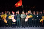 The rescue and relief force of the Ministry of National Defence is welcomed home at the Noi Bai International Airport. (Photo: VNA)