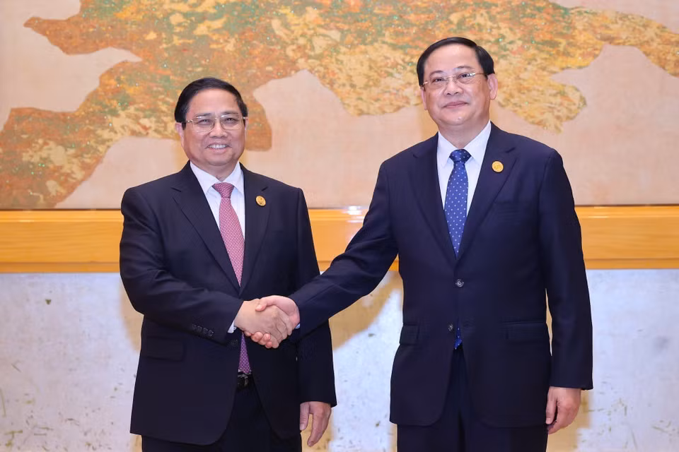 Prime Minister Pham Minh Chinh and his Lao counterpart Sonexay Siphandone. (Photo: VNA)
