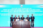 Representatives of Becamex IDC Corp and Fraunhofer ENAS at the signing ceremony (Photo: VNA)