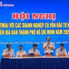 Representatives of Ho Chi Minh City's tax agency address concerns and clarify tax-related issues raised by the FDI business community. (Photo: VNA)