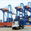 Handling import and export cargo at Gemalink deep-water port in Phu My town, Ho Chi Minh City. (Photo: VNA)
