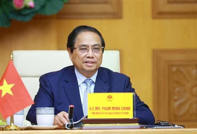 Prime Minister Pham Minh Chinh attends the virtual summit on climate action. (Photo: VNA) vna-potal-thu-tuong-phat-bieu-tai-hoi-nghi-cap-cao-truc-tuyen-ve-khi-hau-7991089.jpg