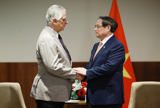 Prime Minister Pham Minh Chinh meets the Industry Federation of the State of Rio de Janeiro (Firjan)’s President Luiz Césio Caetano in Brazil's Rio de Janeiro city on July 7 (local time). (Photo: VNA) vna-potal-thu-tuong-pham-minh-chinh-tiep-lanh-dao-mot-so-tap-doan-hang-dau-brazil-8136320.jpg
